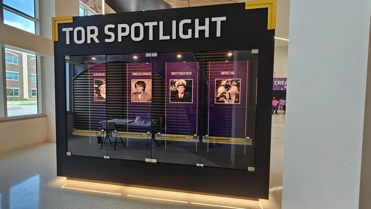 The Tor Spotlight exhibit combines portraits, text, and integrated lighting.